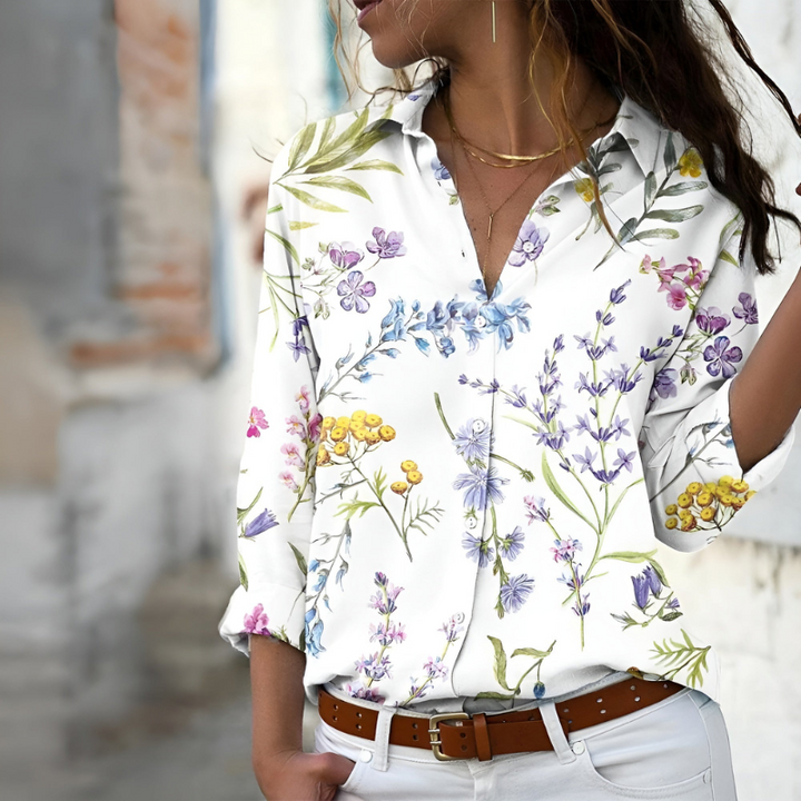 Dames blouse met levendige print en soepel vallende stof voor een elegante, comfortabele pasvorm.