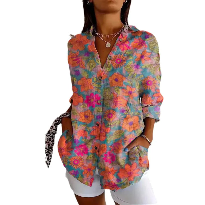 Vrouwelijke blouse met lange mouwen en bloemenprint, combineert elegantie en draagcomfort voor de modebewuste vrouw.