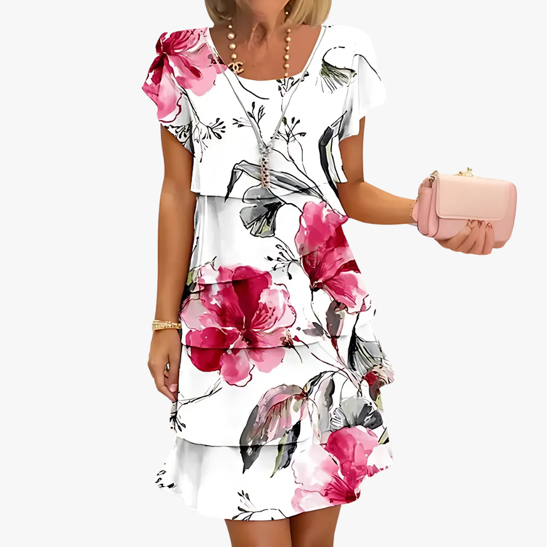 Vrouwelijke maxijurk met bloemenpatroon, lange elegante jurk, comfortabel en stijlvol.