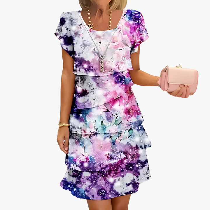 Zomerse dames maxijurk met bloemmotief, ideale jurk voor speciale gelegenheden.