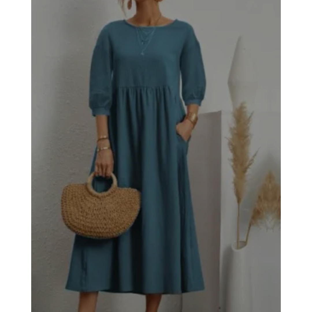 Dames midi jurk met 3/4 mouwen en ronde hals in wit
