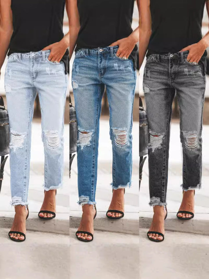 Dames Ripped Denim Jeans, casual pasvorm, gerafelde zoom, urban blauwe jeans, trendy details, veelzijdig te dragen.