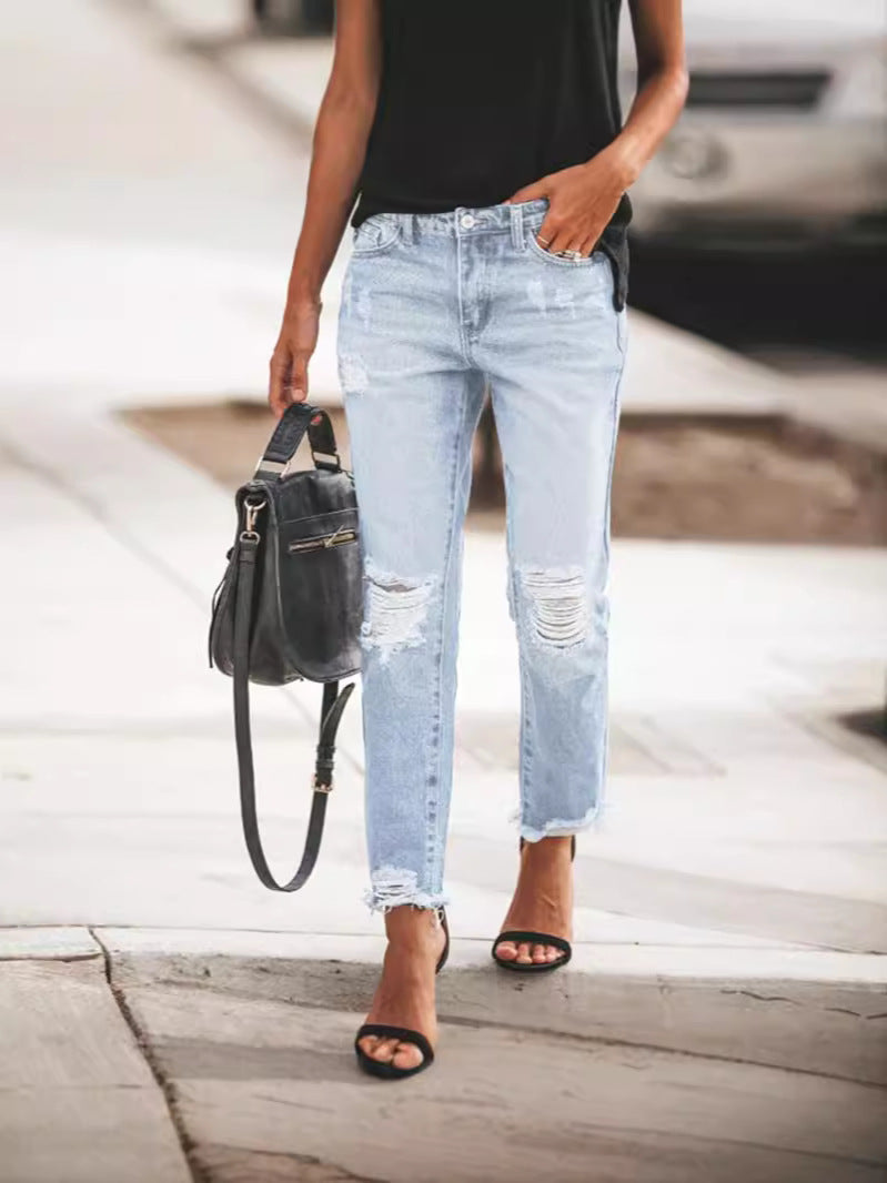 Dames Ripped Denim Jeans, casual pasvorm, gerafelde zoom, urban blauwe jeans, trendy details, veelzijdig te dragen.