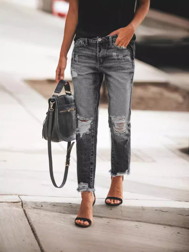 Dames Ripped Denim Jeans, casual pasvorm, gerafelde zoom, urban blauwe jeans, trendy details, veelzijdig te dragen.