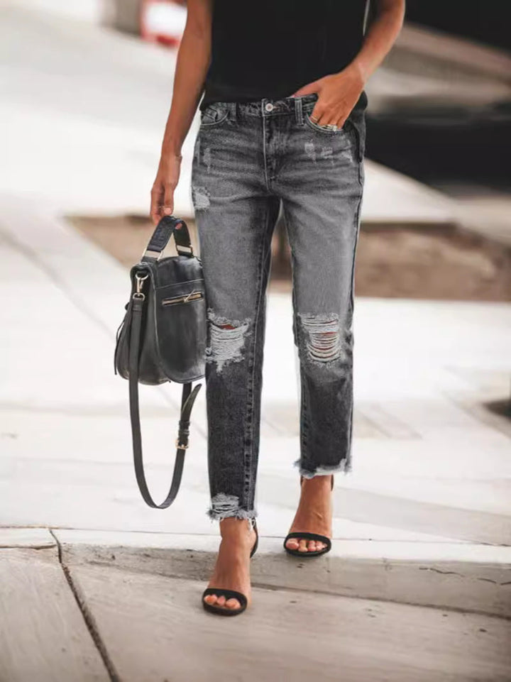 Dames Ripped Denim Jeans, casual pasvorm, gerafelde zoom, urban blauwe jeans, trendy details, veelzijdig te dragen.