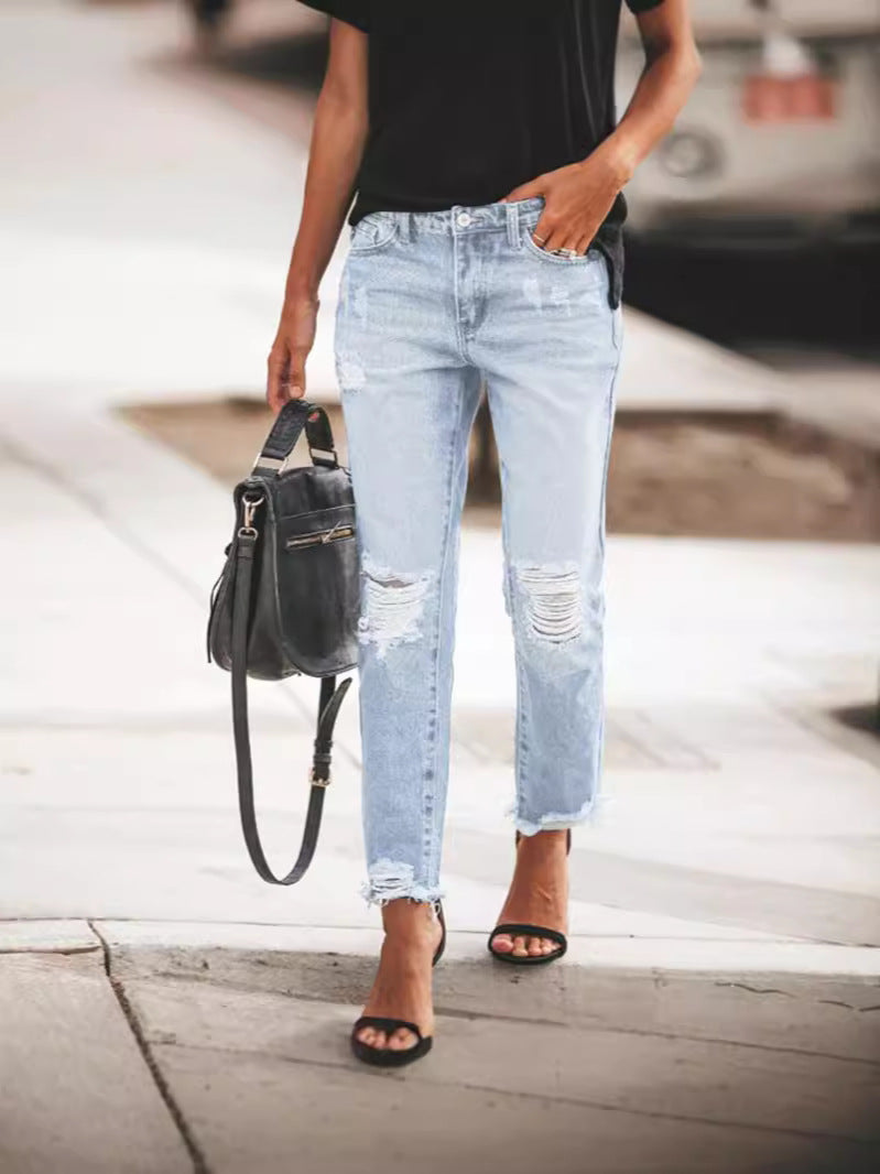 Dames Ripped Denim Jeans, casual pasvorm, gerafelde zoom, urban blauwe jeans, trendy details, veelzijdig te dragen.