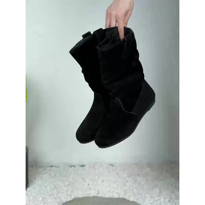 Zwarte dames instap enkellaarsjes, plat en veelzijdig, met antislipzool, elegant ontwerp voor dagelijks comfort.