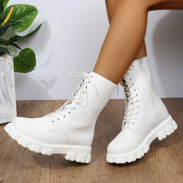 Zwarte dames veterschoenen, robuust met plateauzool en ritssluiting, stijlvol en veelzijdig inzetbaar.