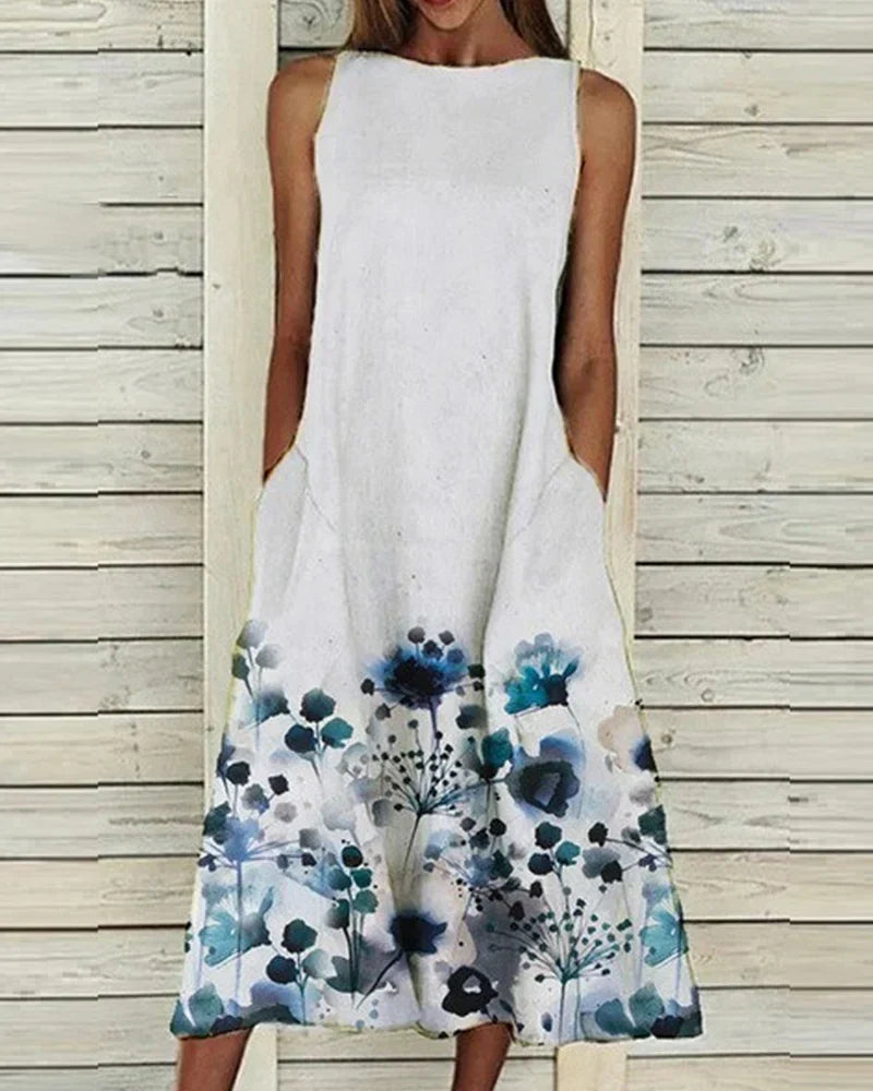 Dames zomerjurk met bloemenprint, A-lijn, midi-lengte, levendige bloemen, ideaal voor zomerse gelegenheden, vrouwelijke pasvorm.