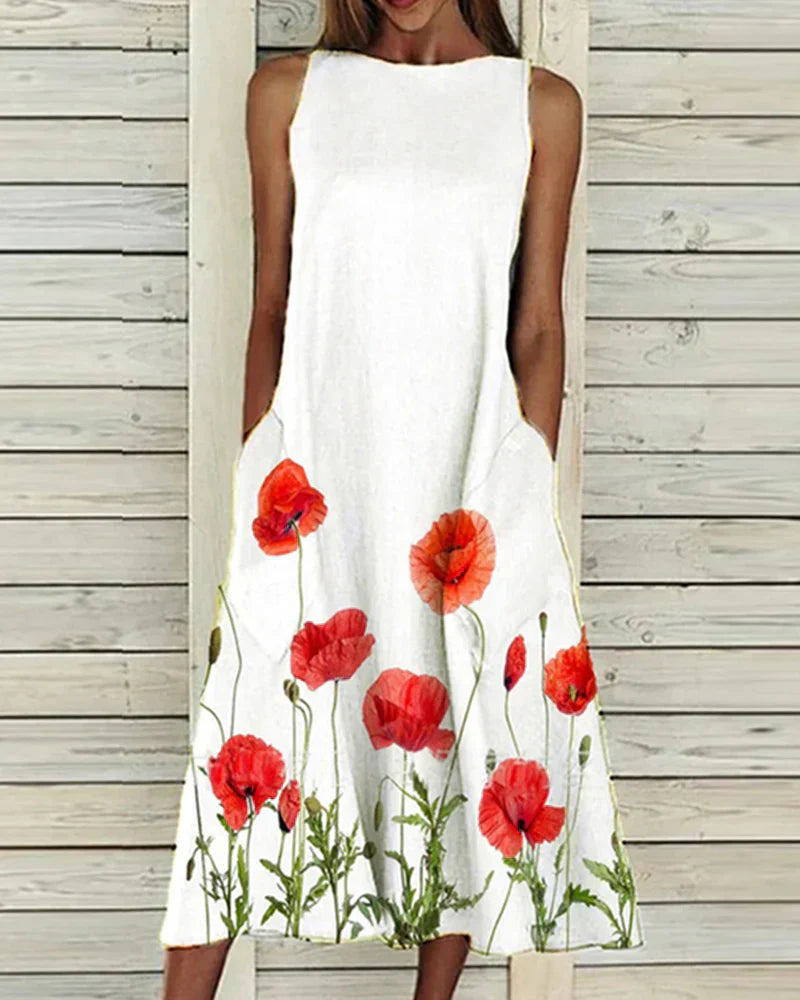 Dames zomerjurk met bloemenprint, A-lijn, midi-lengte, levendige bloemen, ideaal voor zomerse gelegenheden, vrouwelijke pasvorm.