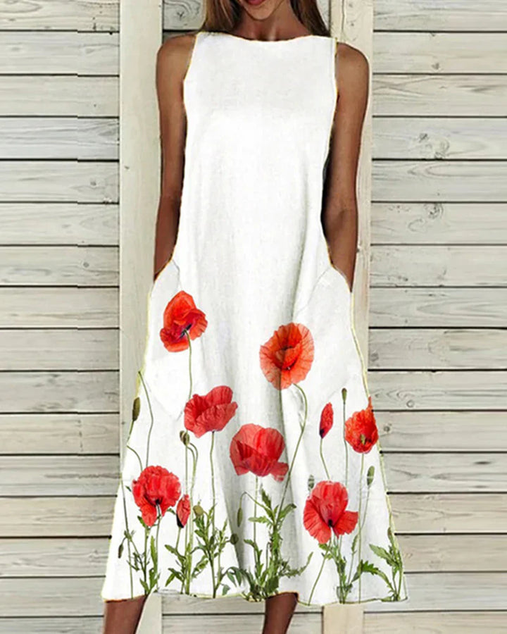 Dames zomerjurk met bloemenprint, A-lijn, midi-lengte, levendige bloemen, ideaal voor zomerse gelegenheden, vrouwelijke pasvorm.