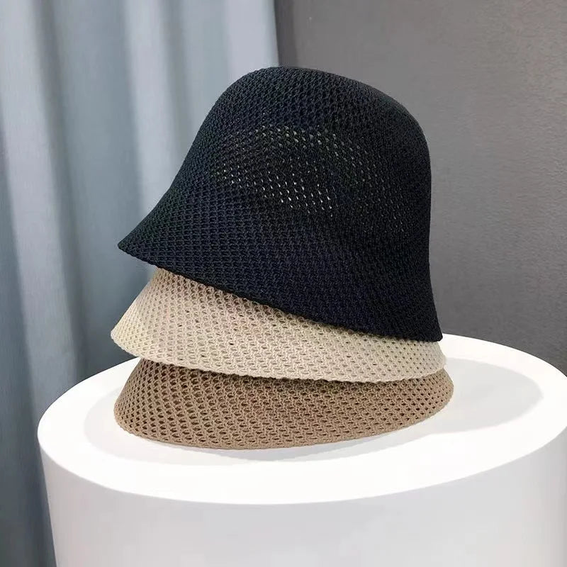 Dames elegante zonnehoed, ademend, met brede rand voor UV-bescherming, opengewerkt design, ideaal voor zonnige dagen.