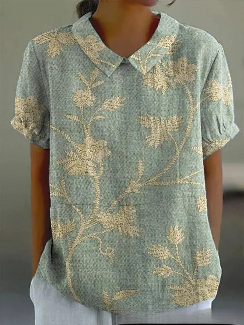Dames top met bloemenprint, licht en ademend, ideaal voor de zomer, verkrijgbaar in diverse kleuren en maten.