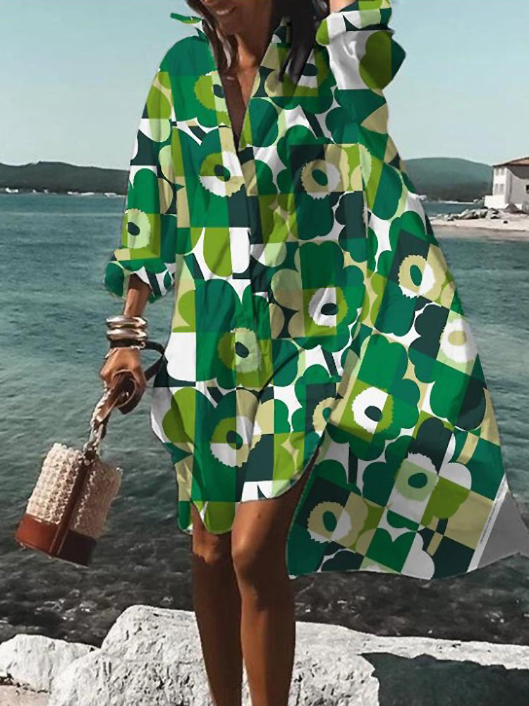 Damesjurk met gedrukte patronen, elegant design, levendige kleuren, figuuraccentuerende pasvorm, veelzijdig en stijlvol.