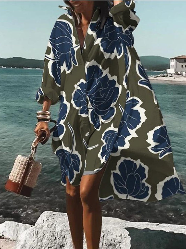Damesjurk met gedrukte patronen, elegant design, levendige kleuren, figuuraccentuerende pasvorm, veelzijdig en stijlvol.