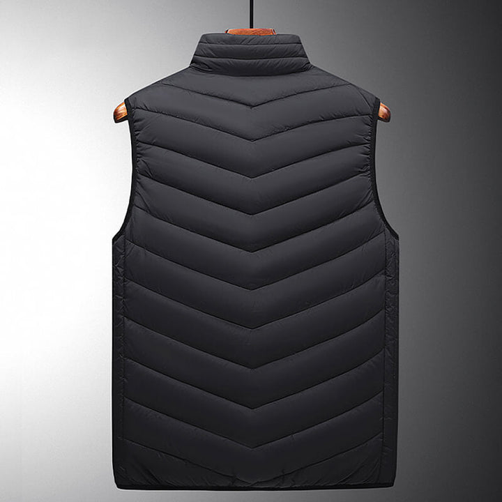 Damesvest met 13 graphene verwarmingzones, slimme bediening en metalen ritssluiting, ideaal voor koude dagen.