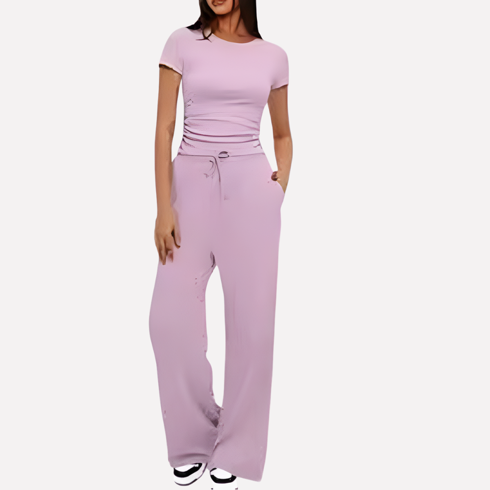 Stijlvolle dames lounge set met trendy croptop en comfortabele broek met wijde pijpen, ideaal voor lente mode.