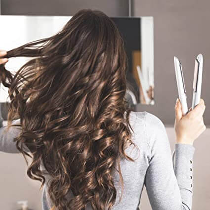 Ergonomisch ontworpen 2-in-1 krultang en stijltang voor dames, comfortabele en snelle haarstyling.