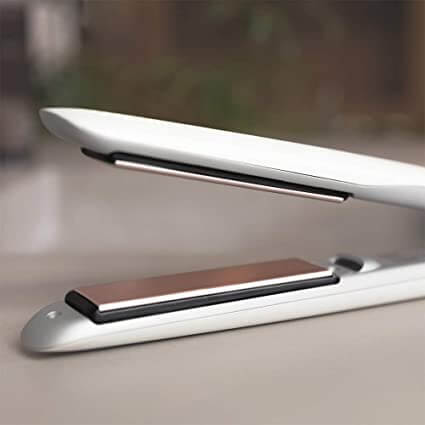 Compacte 2-in-1 krultang en stijltang, de ideale reis haarstyler voor perfecte kapsels overal.