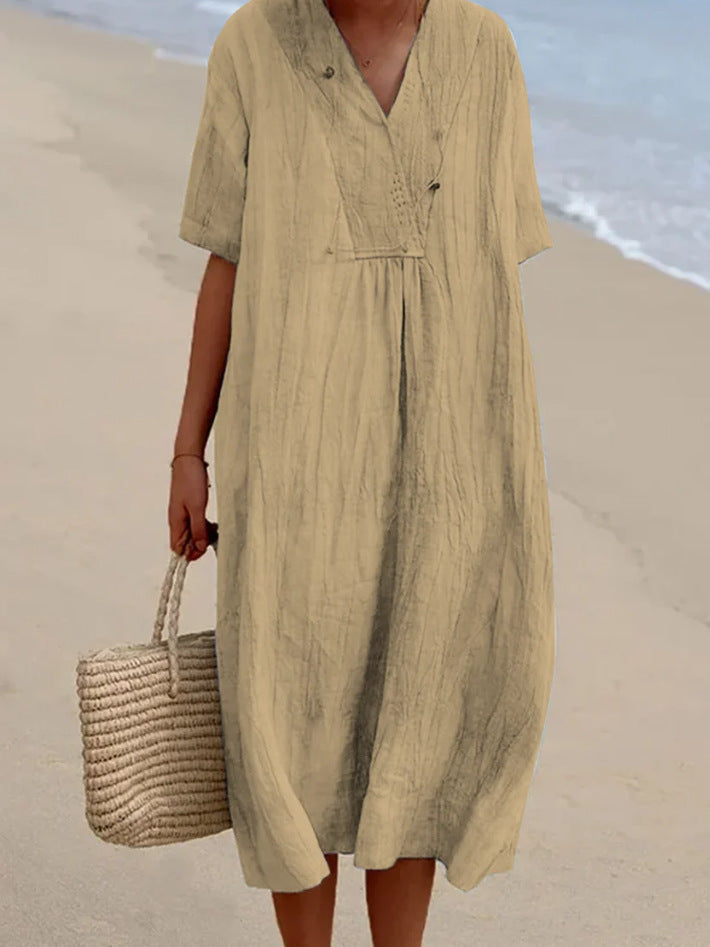 Trendy dames zomerjurk: comfortabele A-lijn midi jurk met V-hals en korte mouwen. Casual, chic & veelzijdig.