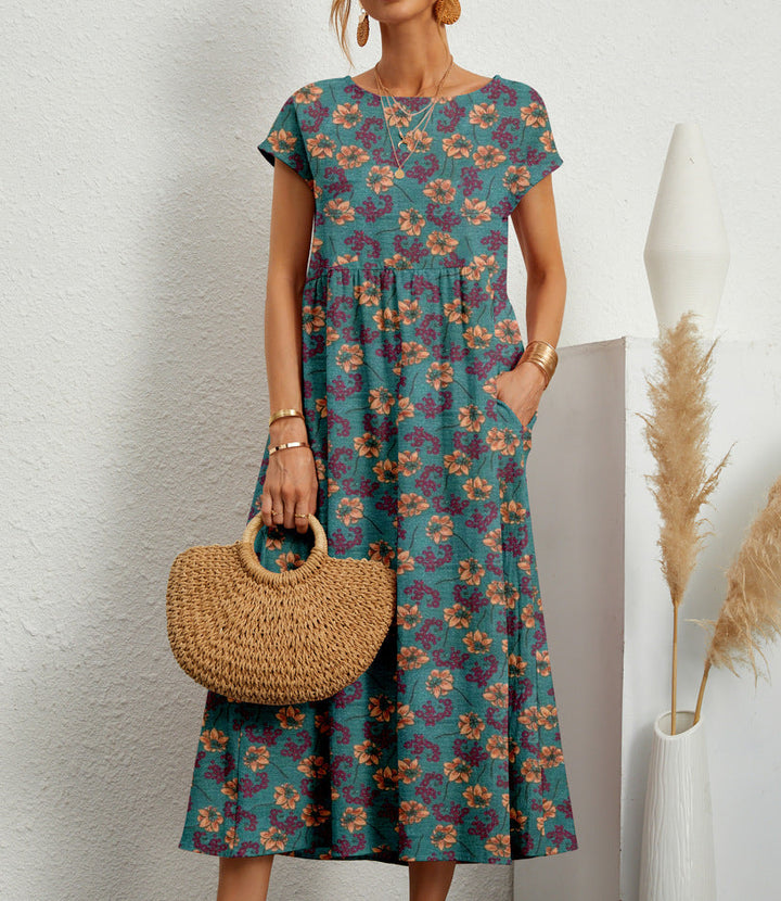 Comfortabele casual damesjurk met bloemenprint, A-lijn model en handige zakken voor dagelijks gebruik.