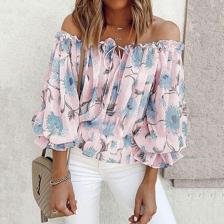 Casual chique dames top: bloemenprint en elegante ruches. Ideale lente/zomer blouse voor diverse gelegenheden.