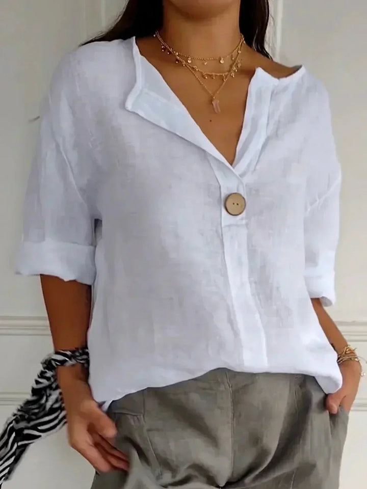 Modieuze oversized dames blouse met knoopsluiting, ideaal als casual top; 3/4 mouw en V-hals.