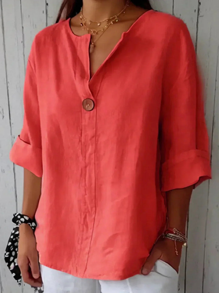 Veelzijdige dames blouse met knoopsluiting, 3/4 mouw en V-hals; modieuze en comfortabele casual top.