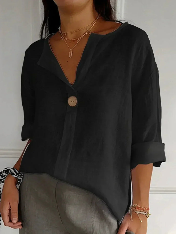 Oversized dames blouse met knoopsluiting, V-hals en 3/4 mouw; luchtige zomerblouse voor optimaal comfort.