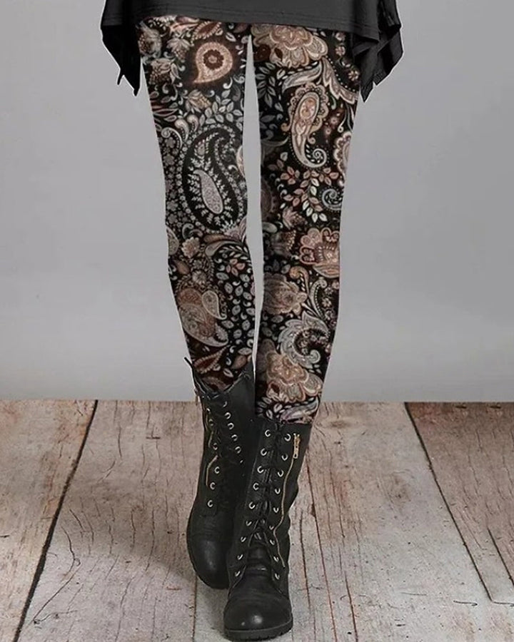 Comfortabele stretch dameslegging Ziva met levendige bohemian retro etnische prints en design.