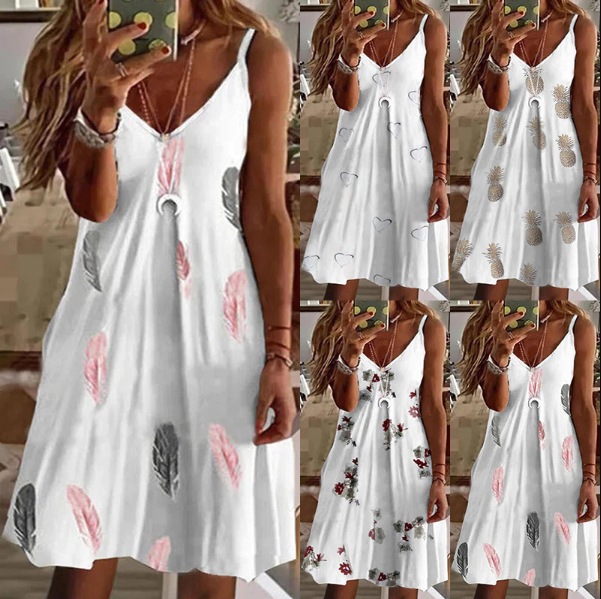 Modieuze dames zomerjurk met boho print, v-hals en spaghettibandjes, geschikt voor casual, strand of feest.