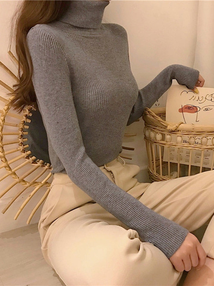 Zachte gebreide coltrui voor dames, comfortabel en warm, een wintermode essential.
