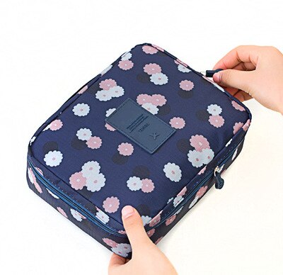 Dames reisaccessoire: compacte waterdichte make-up tas voor cosmetica en beauty essentials.