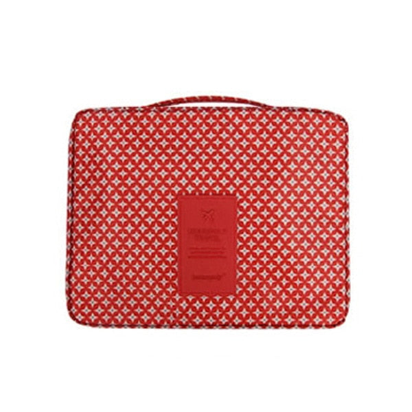 Organiseer je make-up met deze compacte waterdichte reistas. Inclusief mini cosmetica etui.