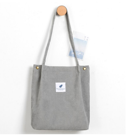 Ruime dames tas van corduroy, multifunctioneel en ideaal voor dagelijks comfort.