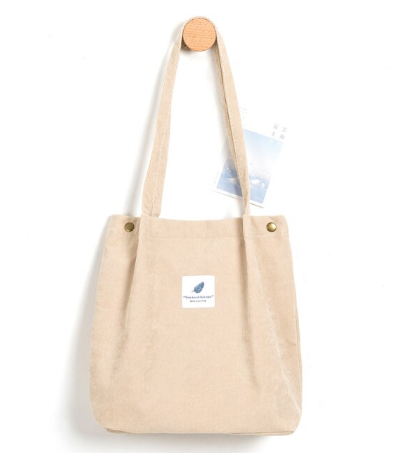 Ruime corduroy schoudertas voor dames, een modieus accessoire voor elke dag.