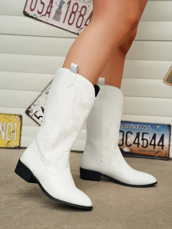 Detail shot van PU-leren dames cowboylaarzen Clara. Zachte voering en stevige zool zichtbaar voor comfort.