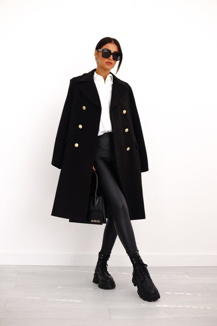 Dames double-breasted lange jas, tijdloos elegant. Perfecte overjas voor herfst en winter.