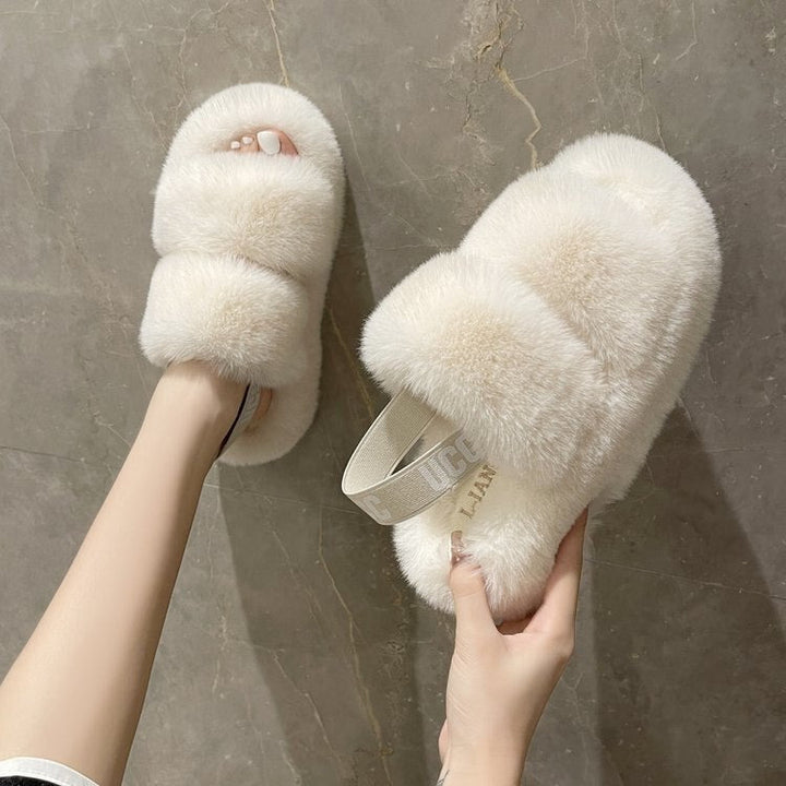 Dames Fluffy Flops™ winter slippers, warm en zacht, perfect om te ontspannen na een lange dag.