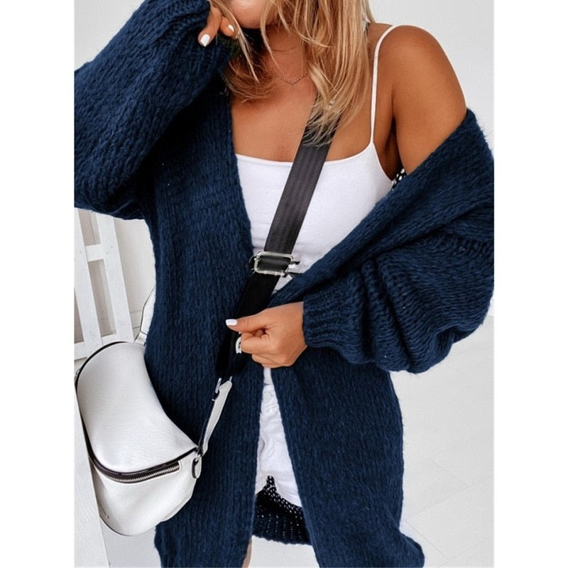 Modern gebreid damesvest, casual-chic mode-item voor de vrouw. Geschikt voor diverse outfits.