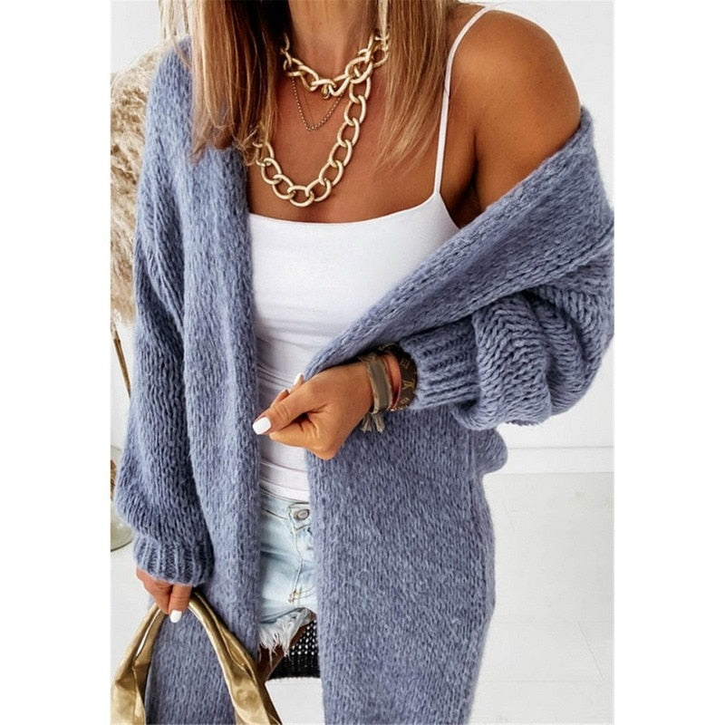 Elegant gebreid damesvest, combineert comfort met moderne stijl. Een must-have item in elke garderobe.