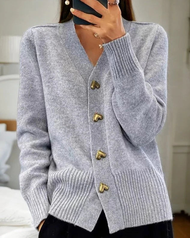 Dames gebreid vest met v-hals en stijlvolle knoopsluiting, ideaal voor laagjes.