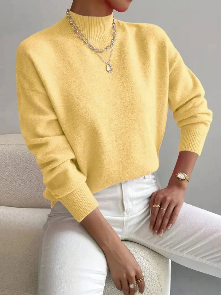 Nieuwe dames mode trui: gebreid, hoge kraag, perfect voor koud weer.
