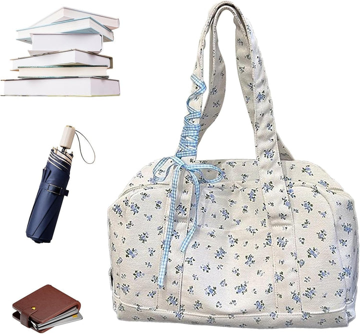 Roze canvas duffeltas dames, met elegant blauw lintdetail, perfect voor een weekendje weg.