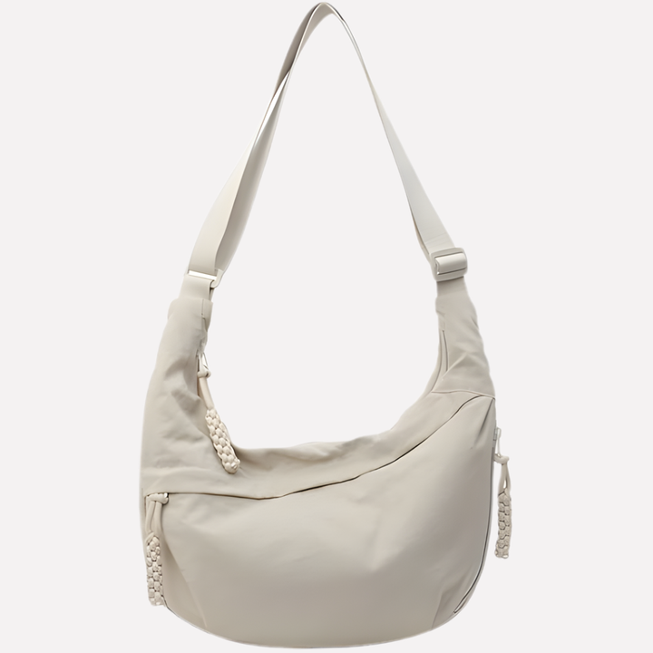 Dames halvemaan crossbody tas van nylon. Stijlvol en ruim, perfect voor dagelijks gebruik.