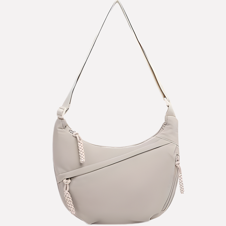 Vrouwen halvemaan crossbody tas met comfortabele verstelbare band voor optimaal draaggemak.