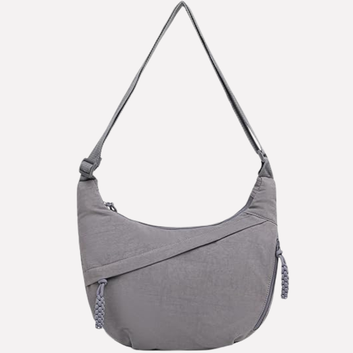 Modieuze vrouwen tas, halvemaan crossbody. Functionele en stijlvolle dagelijkse accessoire.
