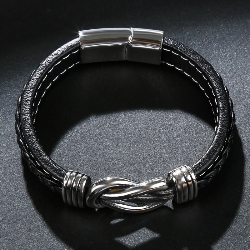 Robuuste zwarte lederen knoop armband voor dames, met een tijdloze infinity symbool, ideaal als stijlvol accessoire.