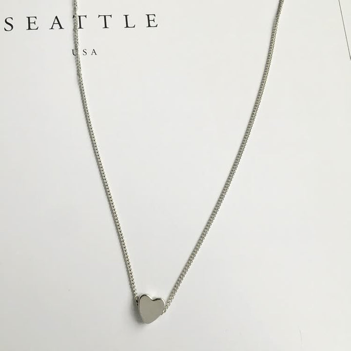 Zilveren ketting voor dames, minimalistisch hartje design. Subtiel en elegant sieraad voor elke outfit.