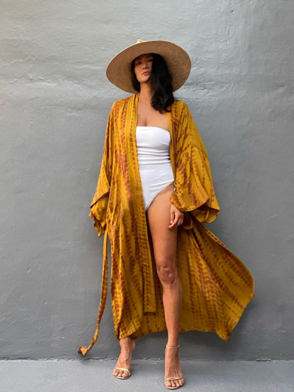 Eenheidsmaat dames kimono met strikriem, perfect voor zomerse dagen en als trendy strandkleding.